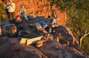 Eating Breakfast on the side of the Bluff at sunrise